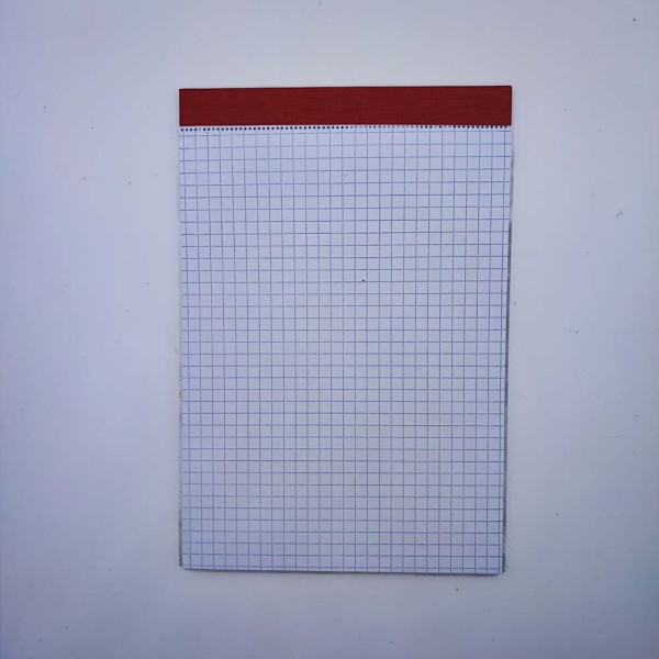 Jegyzettömb NYOMELL A/5 50 lapos kockás fejben sapkázott perforált