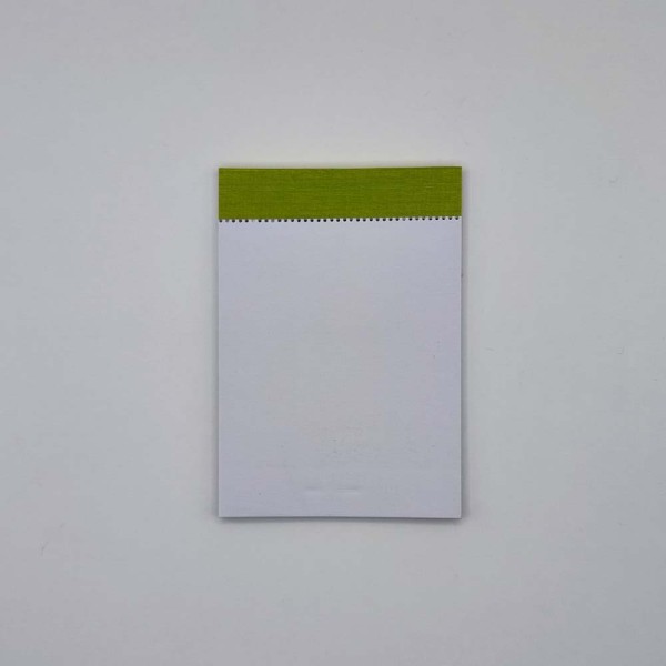 Jegyzettömb NYOMELL A/7 50 lapos sima fejben sapkázott perforált